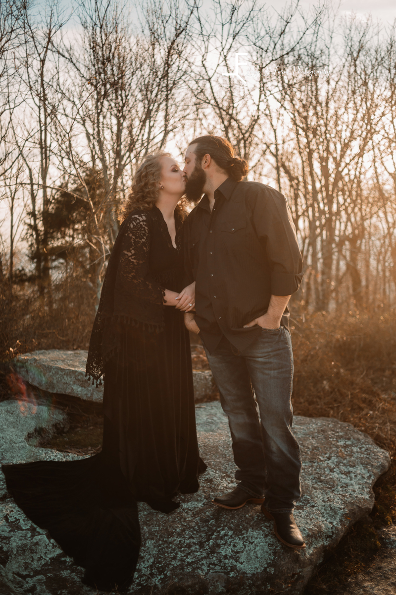 Laze L Farm Photography | Engagement  | Taylorsville NC | couple kissing with trees in background