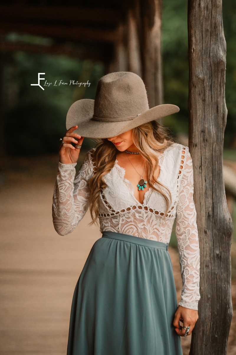 Laze L Farm Photography | Western Lifestyle | Taylorsville NC | girl posing with hat downwards