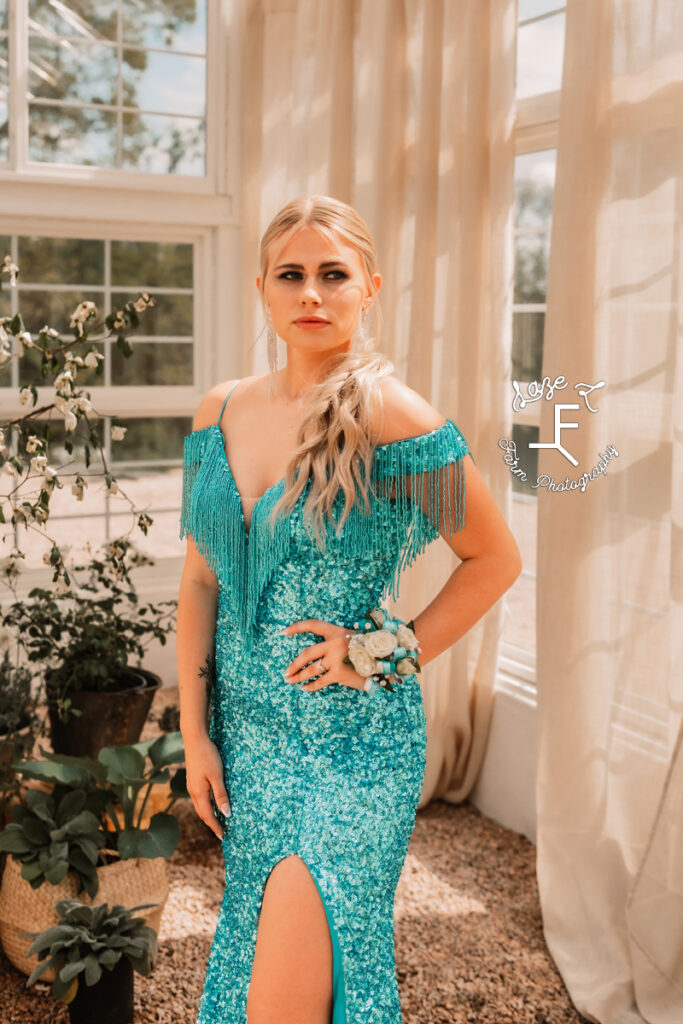 Reid in turquoise sequin fringe dress
