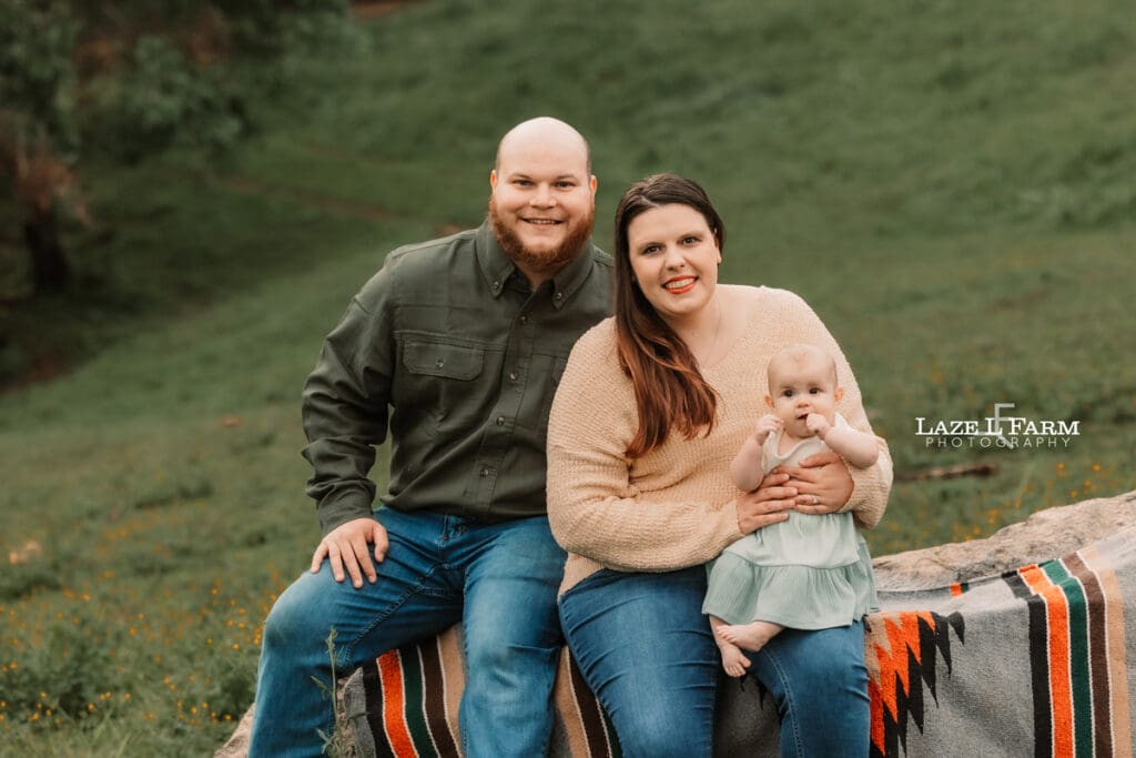 family pictures sitting on the rocks