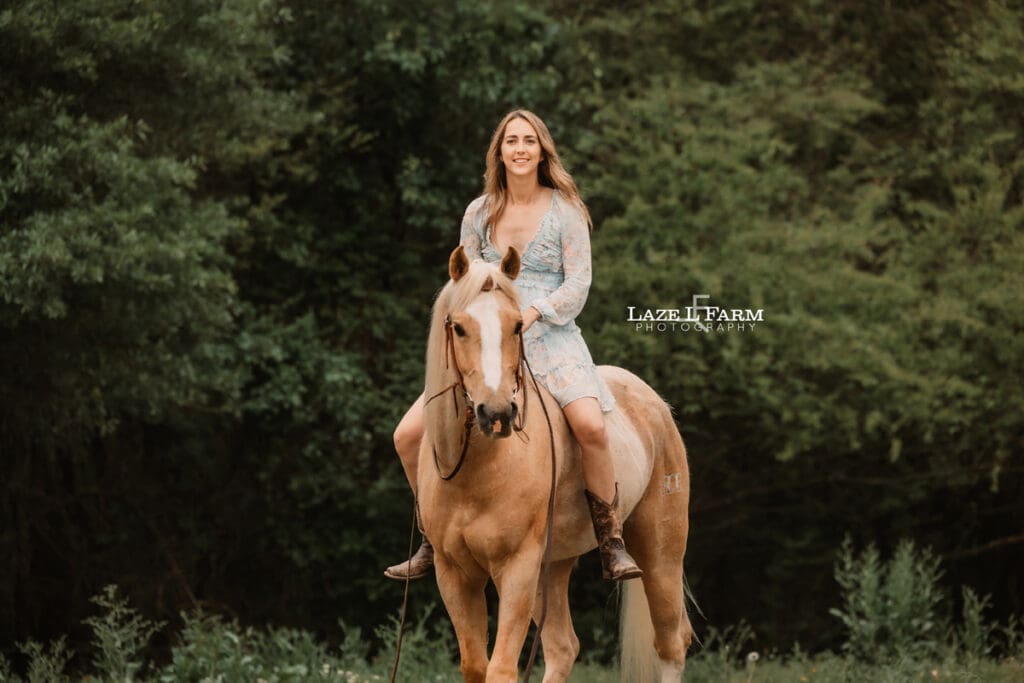 girl riding her horse towards the camera