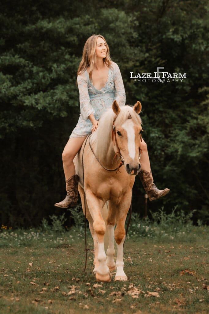girl riding her horse towards the camera