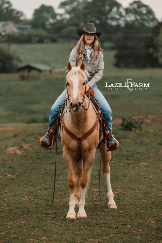 girl riding her horse