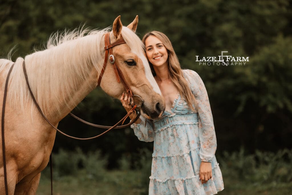 girl hugging her horse