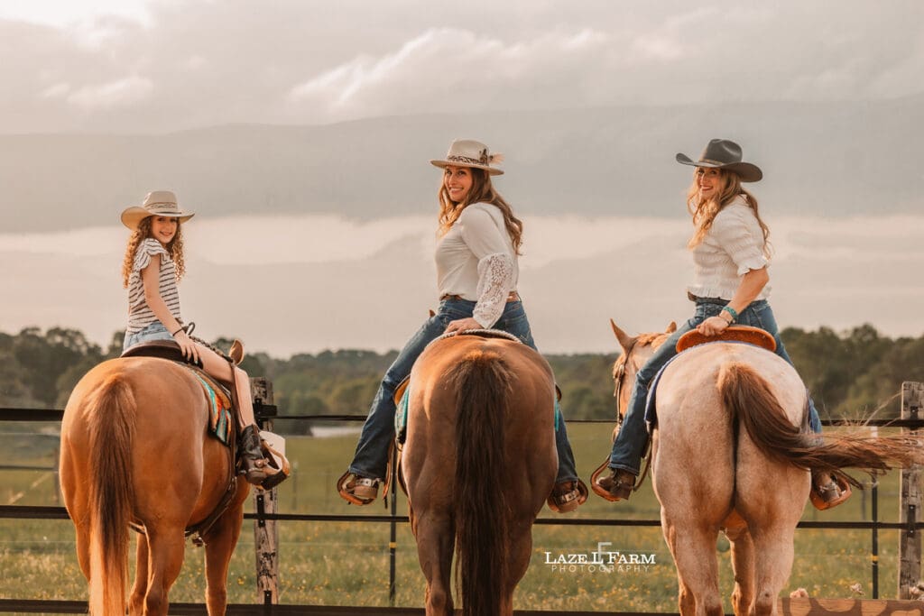 three cowgirls looking at the camera