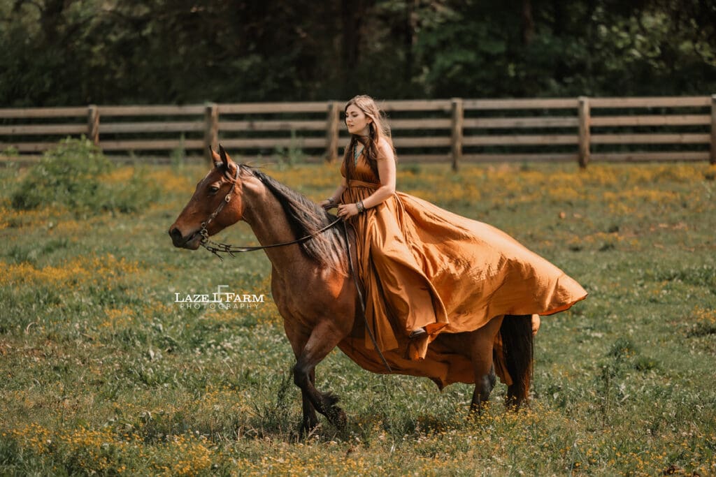 cowgirl riding her horse in a parachute dress