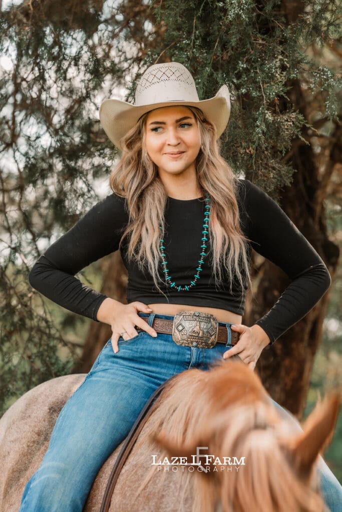 cowgirl riding her horse