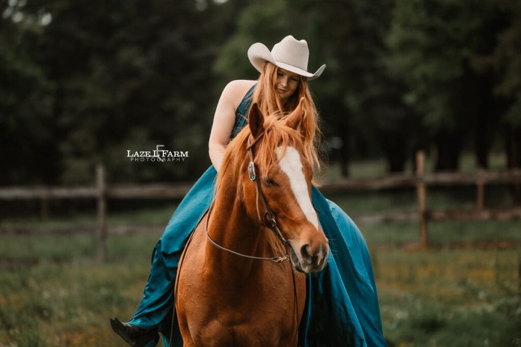cowgirl riding her horse in a parachute dress