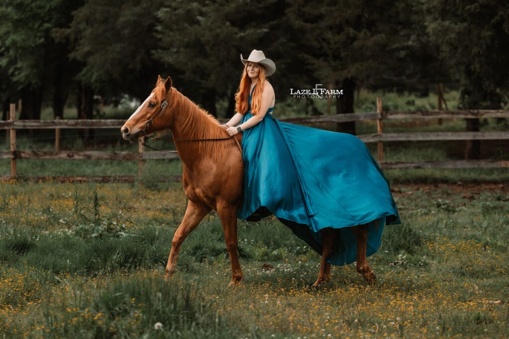 cowgirl riding her horse in a parachute dress