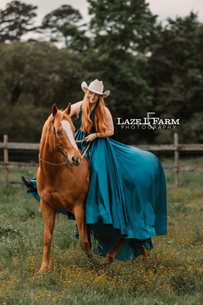 cowgirl riding her horse in a parachute dress