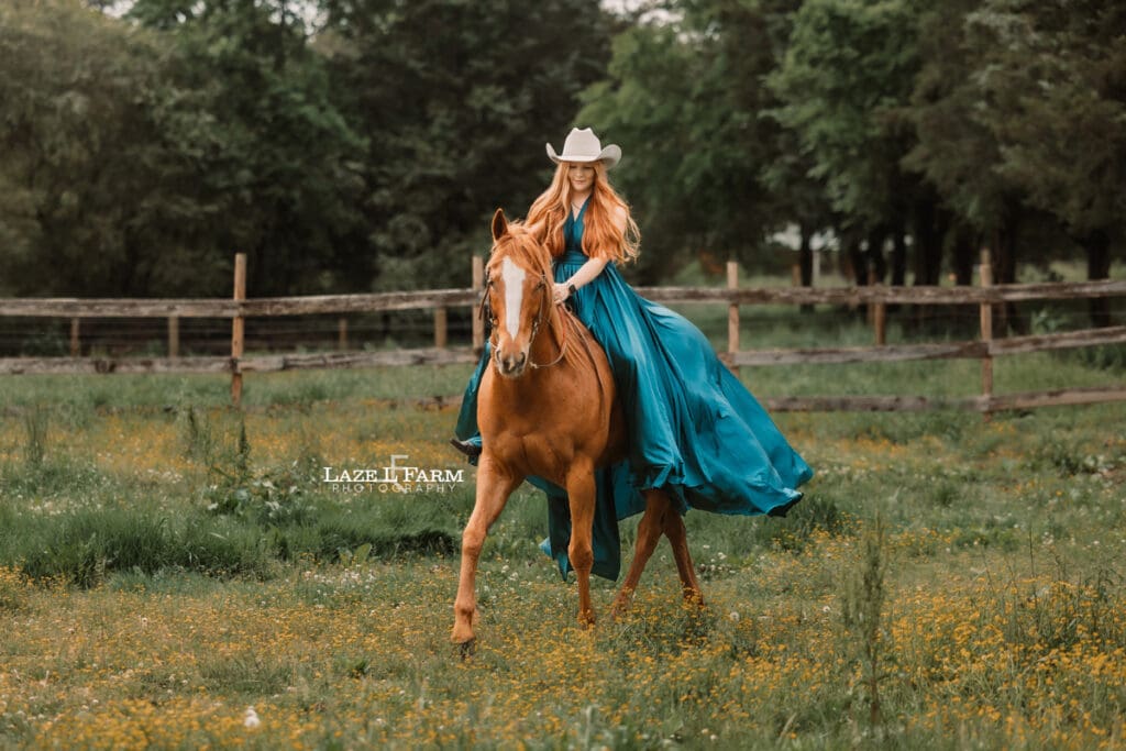 cowgirl riding her horse in a parachute dress