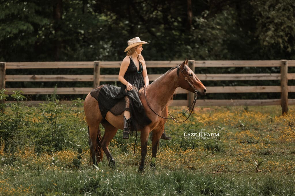 cowgirl riding her horse in a parachute dress