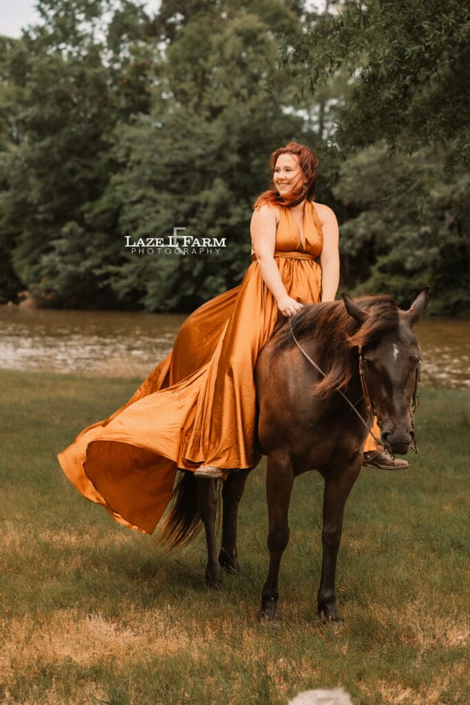 cowgirl sitting on her horse