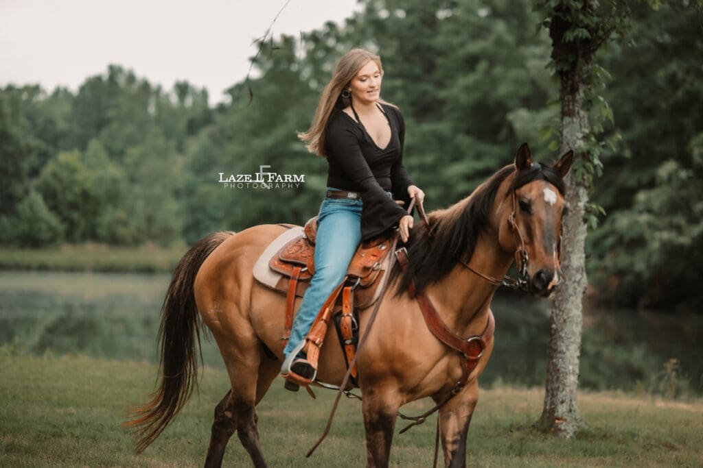 cowgirl riding her horse