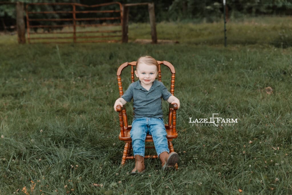 little boy in a rocking chair
