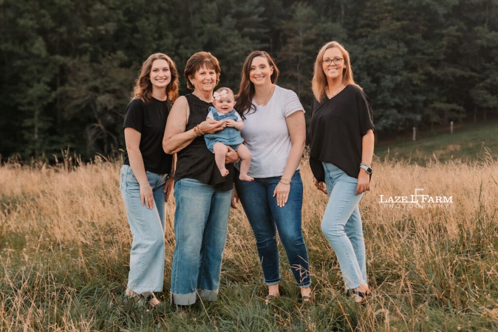 all the girls of the family out in a field at sunset
