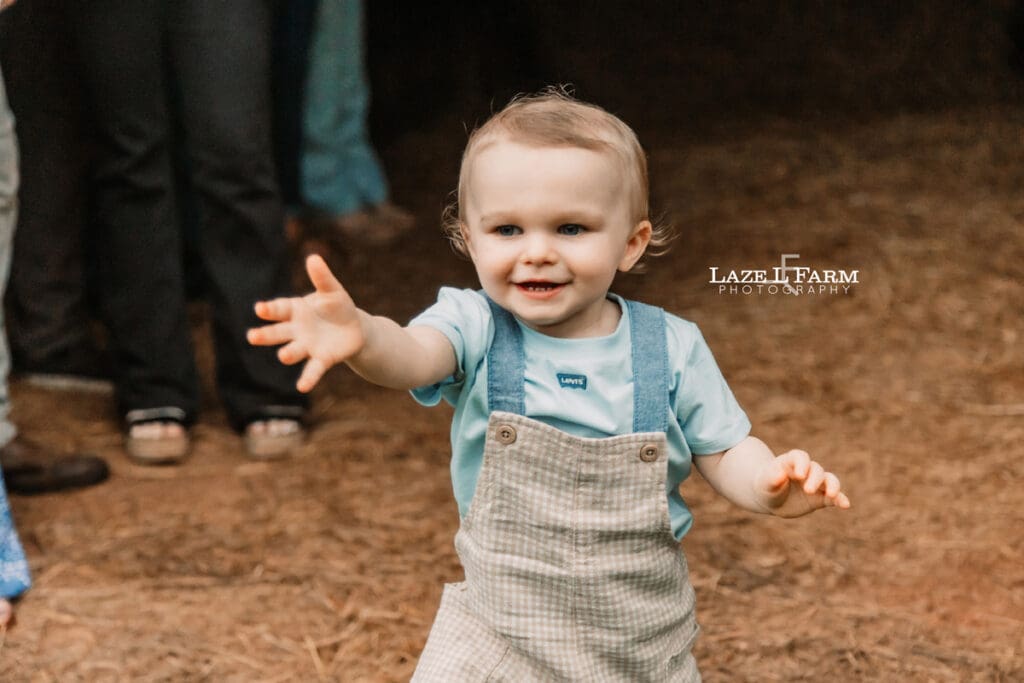 little boy running towards the camera