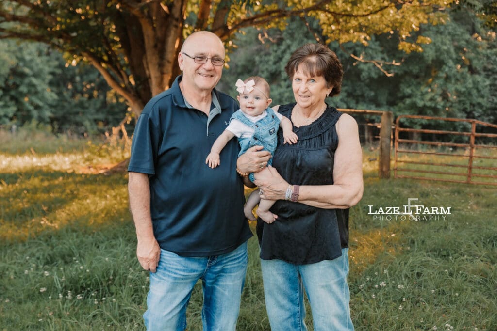 grandparents with their granddaughter