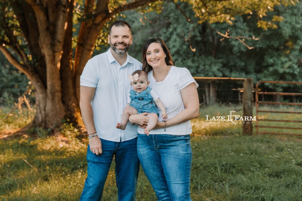 couple with their little girl during family pictures
