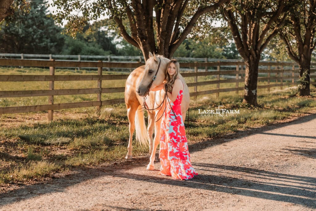 girl with her palomino horse