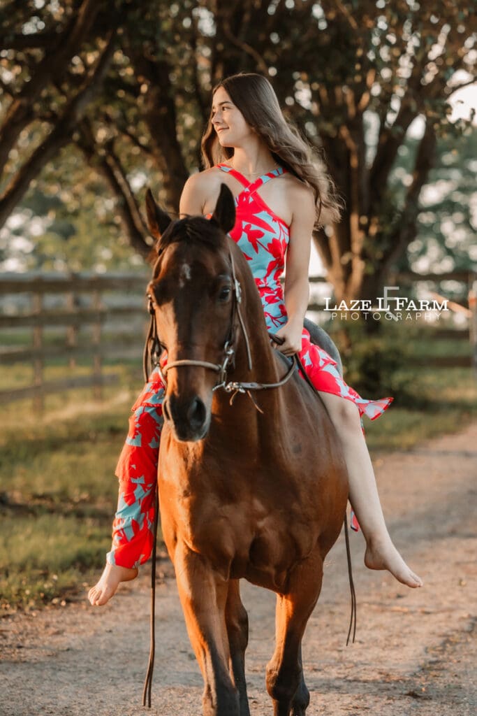 girl riding her horse