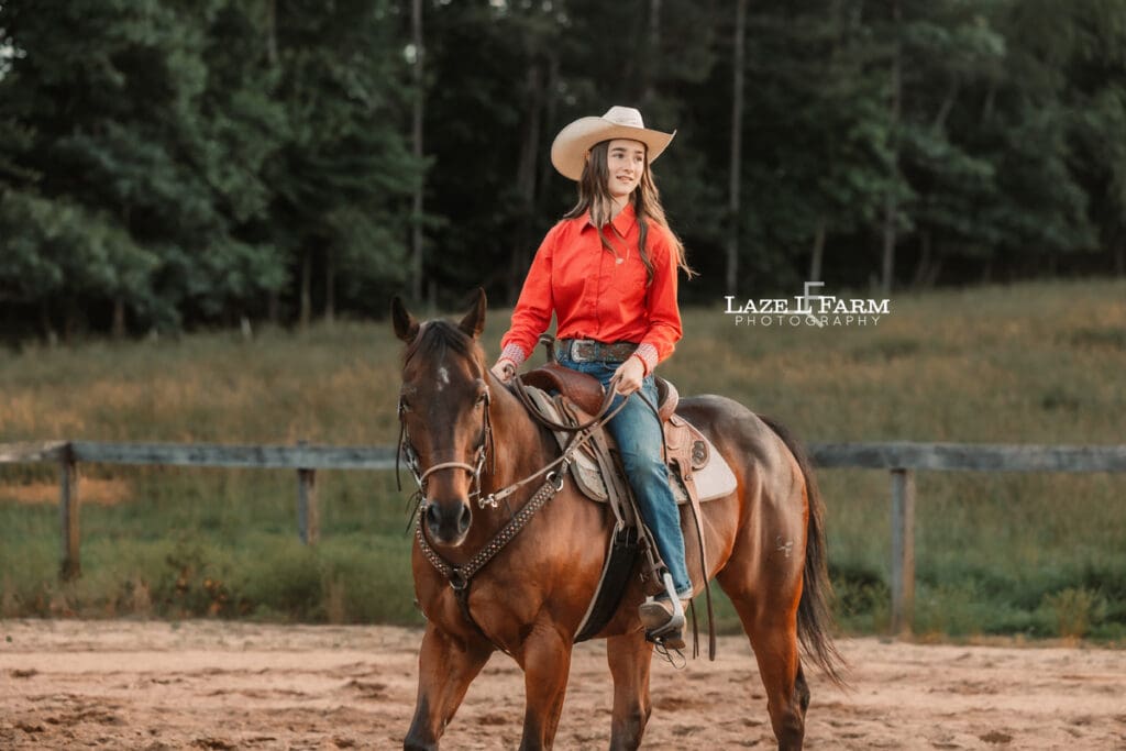 cowgirl riding her horse