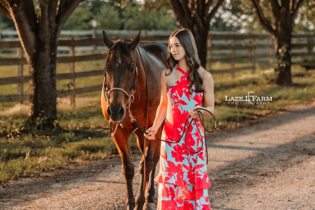 girl looking at her horse