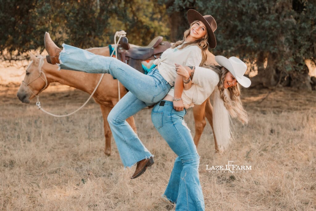 cowgirl best friends lifting each other up