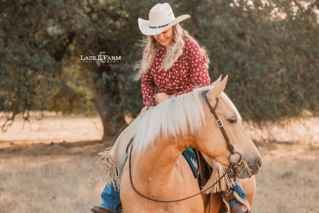 cowgirl sitting on her horse