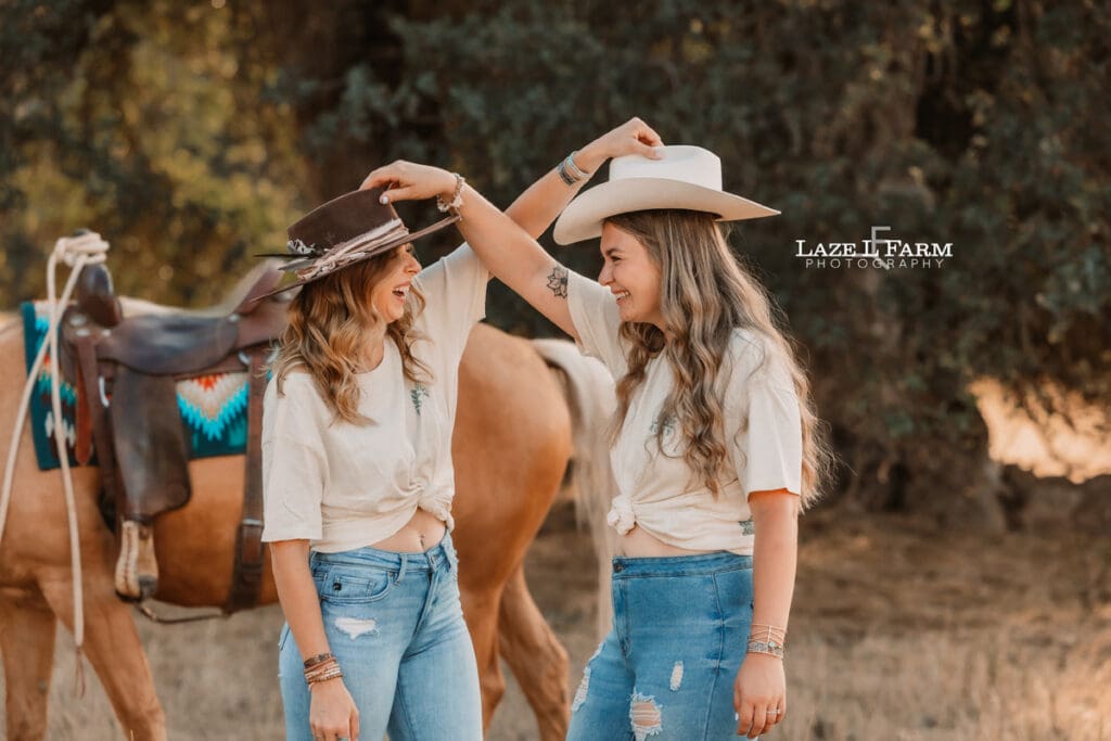 cowgirl best friends swapping hats