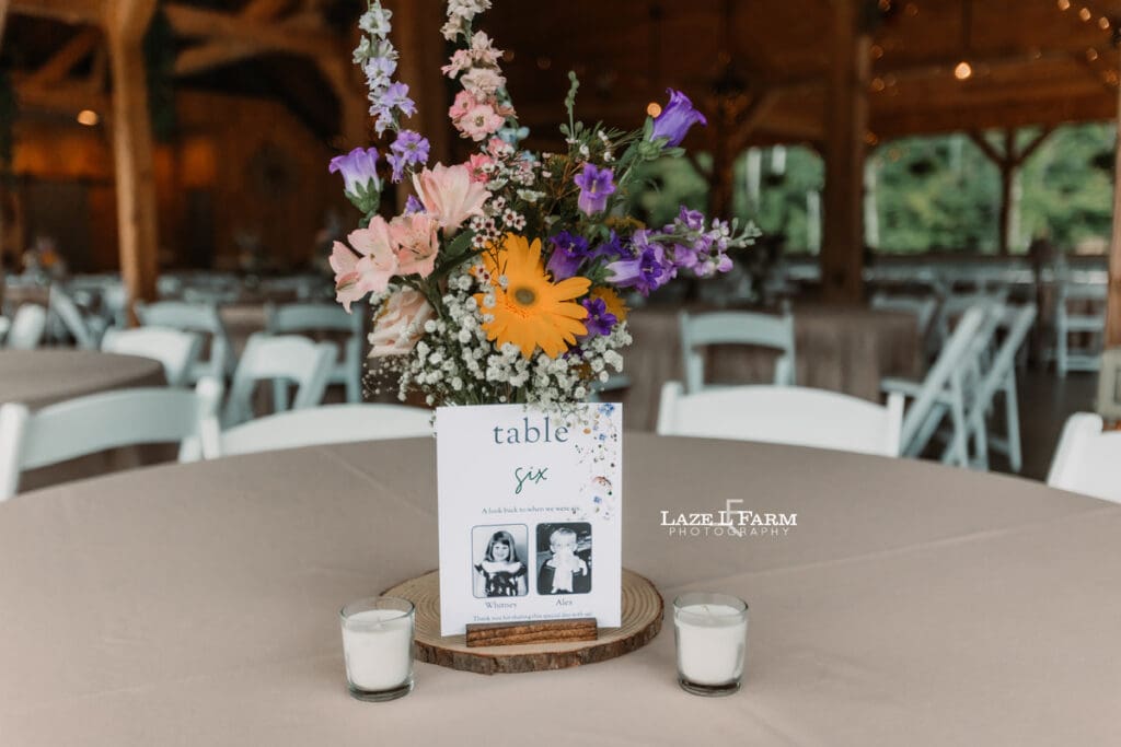 Details for the reception tables during the wedding at Woodside Farm in Graham, NC with pictures by Laze L Farm Photography