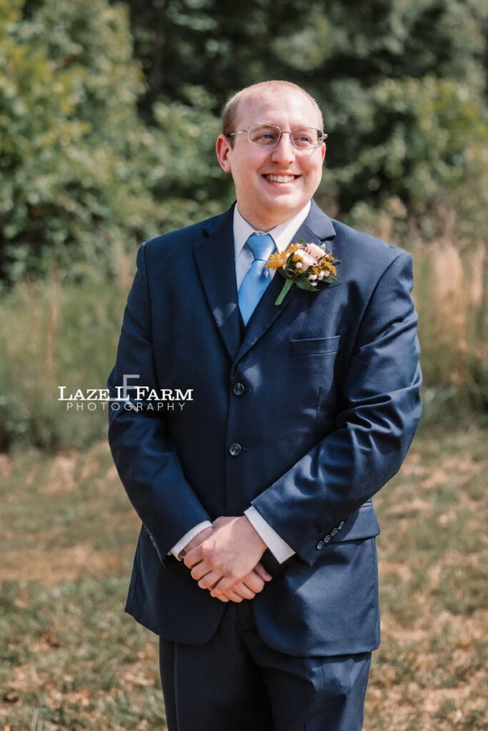 Groom on his wedding day at Woodside Farm in Graham, NC with pictures by Laze L Farm Photography
