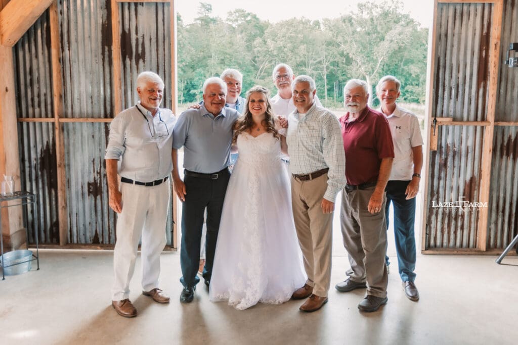 Family pictures during the wedding at Woodside Farm in Graham, NC with pictures by Laze L Farm Photography