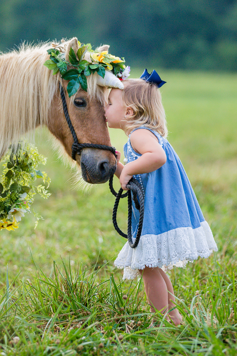 Laze L Farm Photography | A girl and her pony kissing the pony