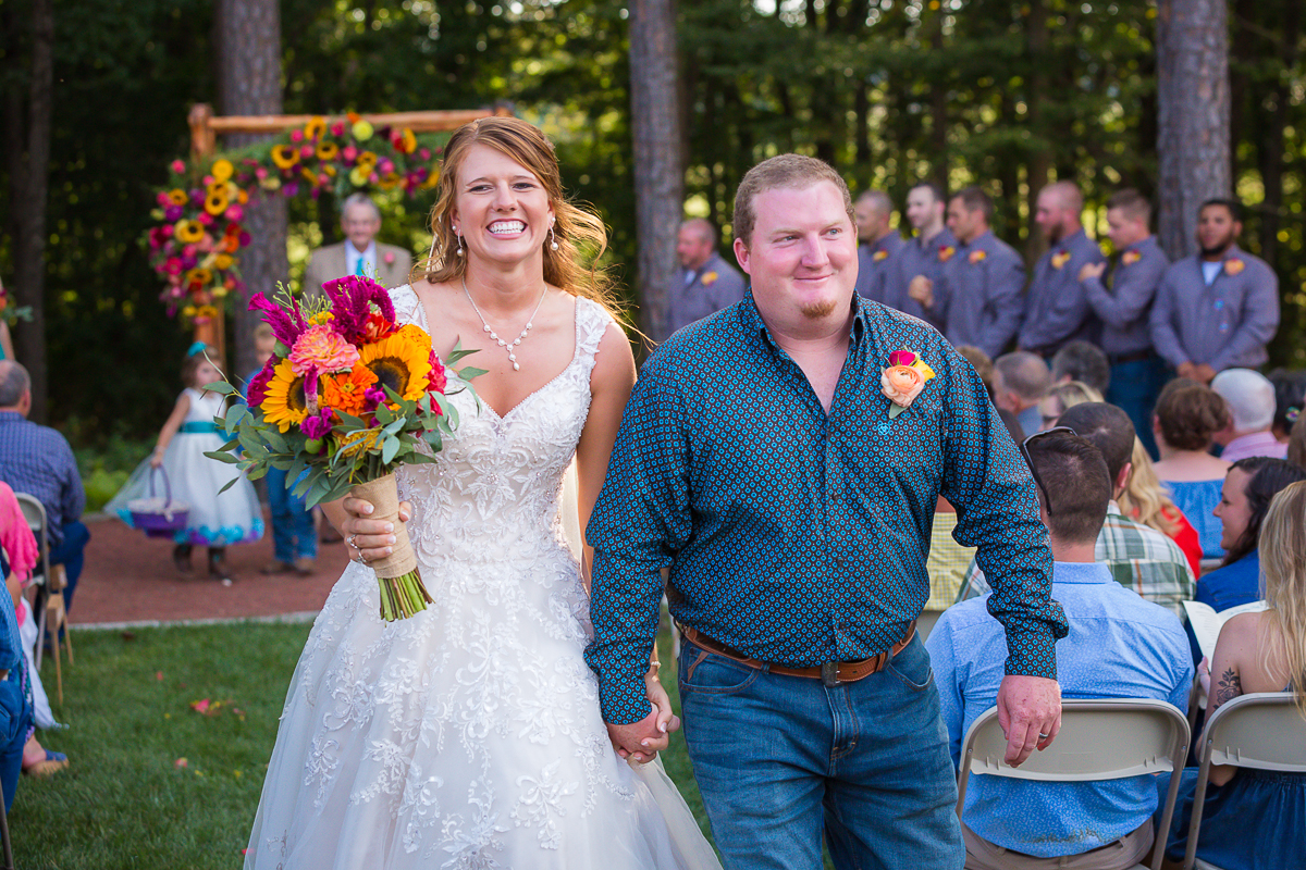 Laze L Farm Photography | Danner Farms | couple leaving wedding
