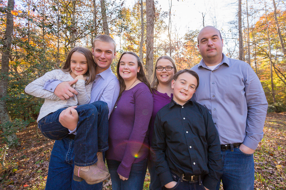 Laze L Farm Photography | Farm Session | Taylorsville NC | family hugging each other