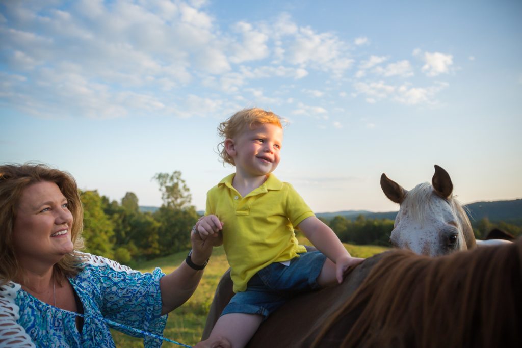 Laze L Farm Photography | Farm Session | Taylorsville North Carolina | a little boy riding a horse