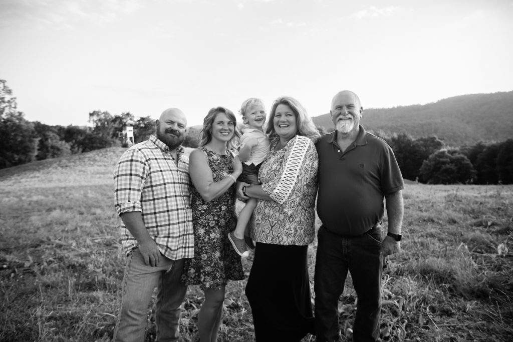 Laze L Farm Photography | Farm Session | Taylorsville North Carolina | a family on top of a mountain