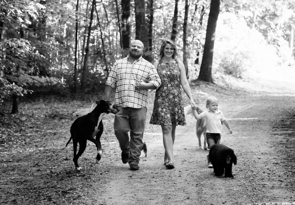 Laze L Farm Photography | Farm Session | Taylorsville North Carolina | A family walking down the dirt road