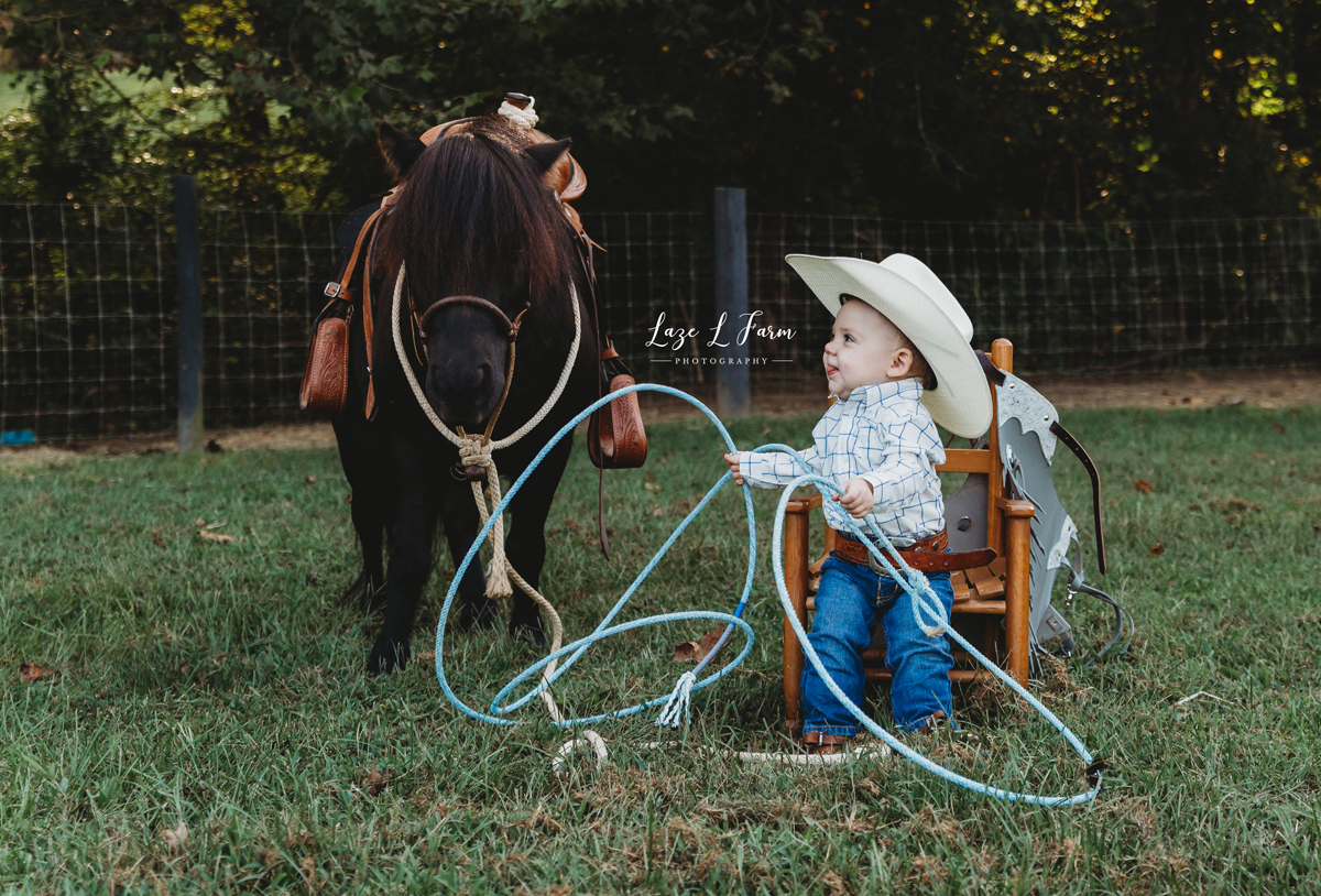 Laze L Farm Photography | Little Cowboy Birthday Session | Lenoir NC | a little cowboy and his pony