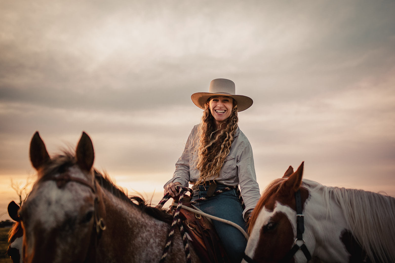The Western Way Podcast | Jodie from Green Gold and Blues | cowgirl with two horses