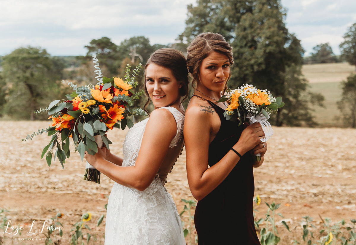 Laze L Farm Photography | Western Wedding | Johnny Wilson Farm | Bridesmaid and Bride