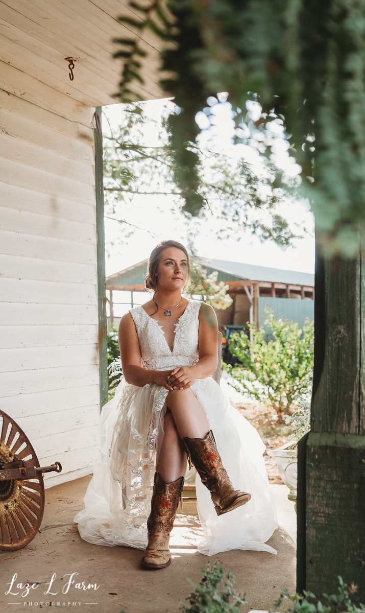 Laze L Farm Photography | Western Wedding | Johnny Wilson Farm | Western Bride on Front Porch