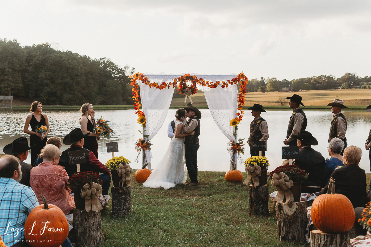 Laze L Farm Photography | Western Wedding | Johnny Wilson Farm | Ceremony First Kiss