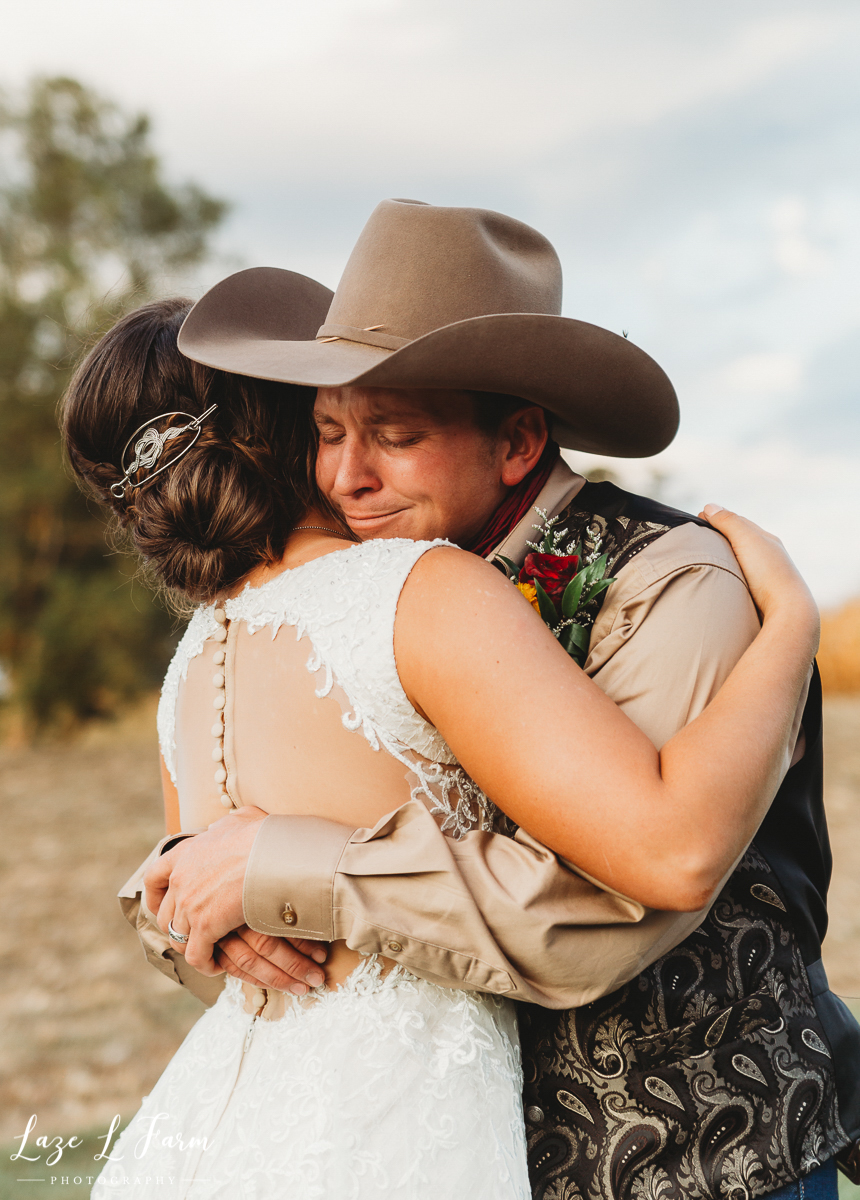 Laze L Farm Photography | Western Wedding | Johnny Wilson Farm | Bride and Groom Hugs