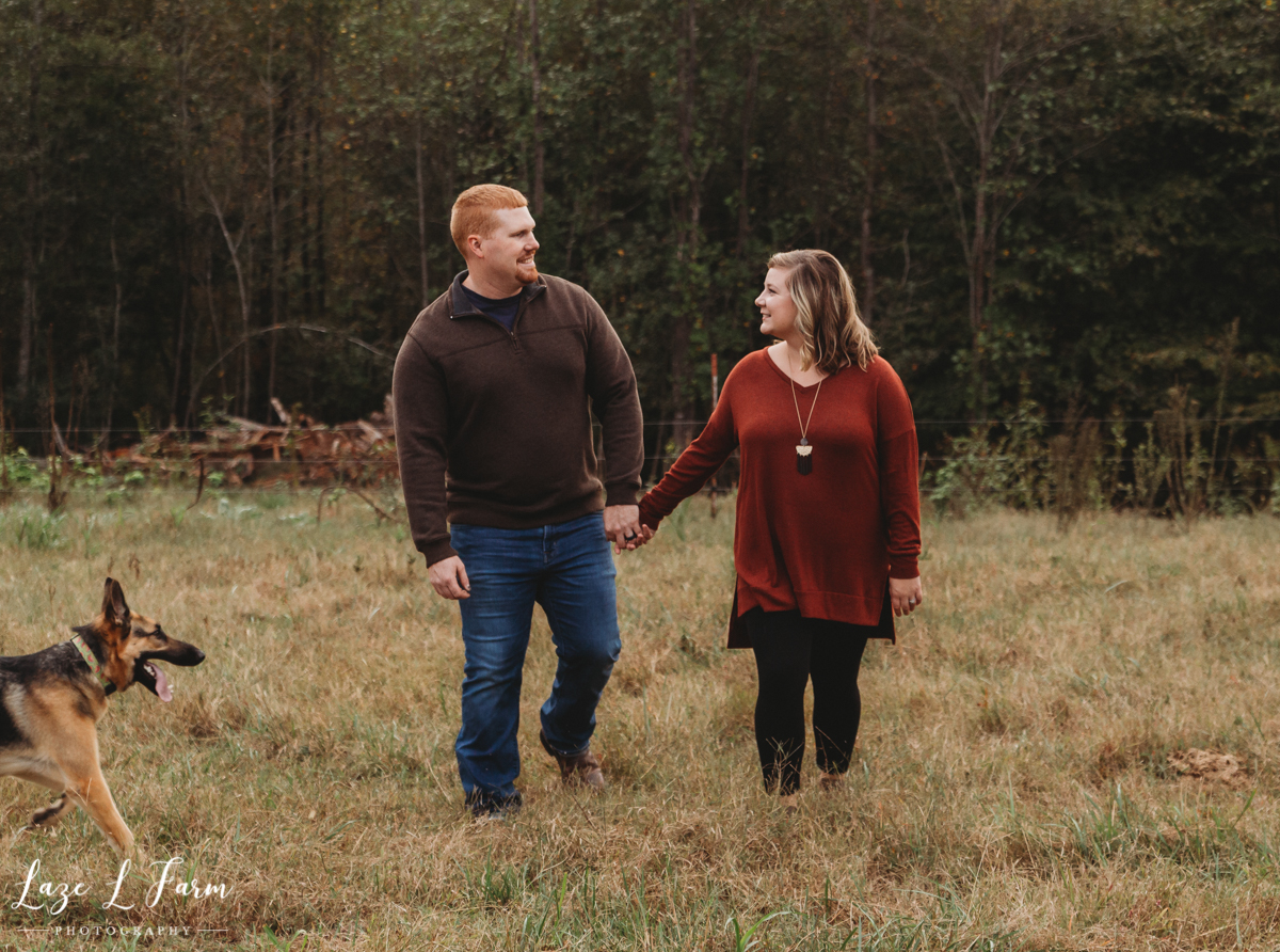 Laze L Farm Photography | Farm Pregnancy Announcement | Taylorsville NC | Husband and Wife Walking Portraits