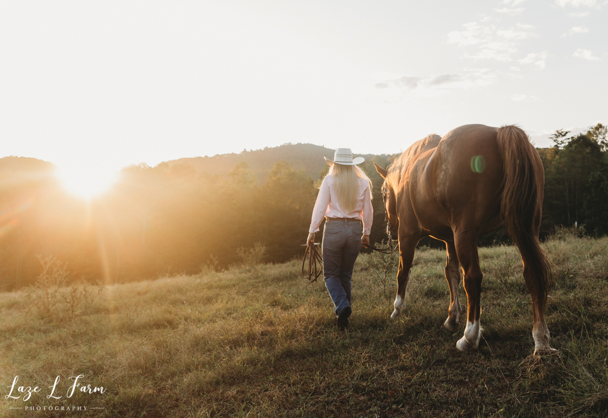 Laze L Farm Photography | Western Equine Photography | Payton Bush | Taylorsville NC | Cowgirl and Her Horse Walking into Sunset