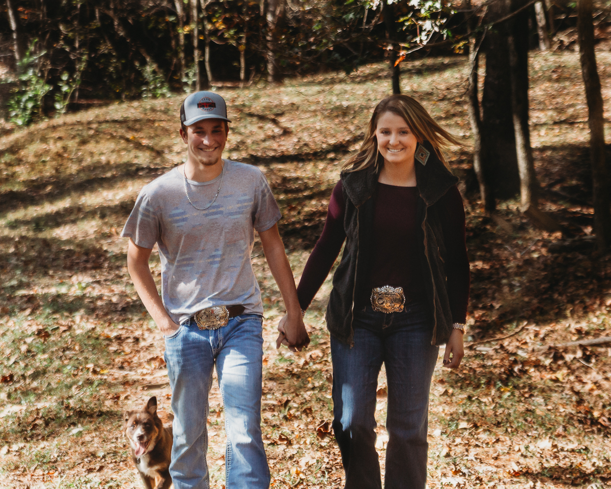 Laze L Farm Photography | Couples Session | Taylorsville NC | couple walking together in the woods