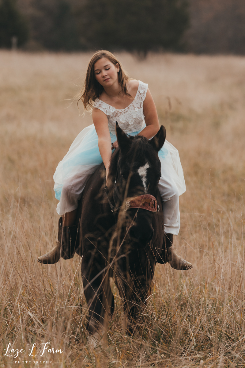 Laze L Farm Photography | Cowgirl photoshoot | Cleveland NC | a girl riding her horse bareback