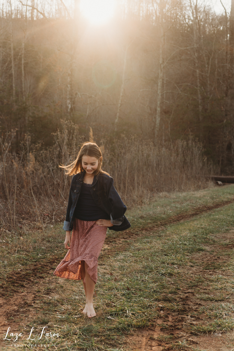 Laze L Farm Photography | farm session | Taylorsville NC | young girl walking in a field
